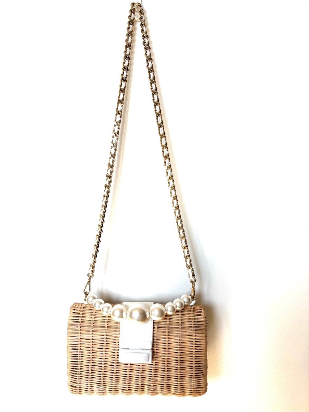 BTB Los Angeles Rattan purse with white accent and pearl handle and chain strap